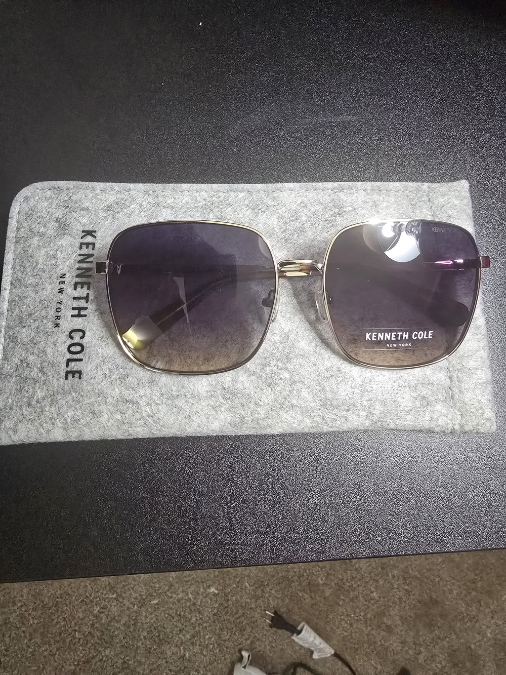 Kenneth Cole Gold Frame Sunglasses with Gradient Purple Lenses